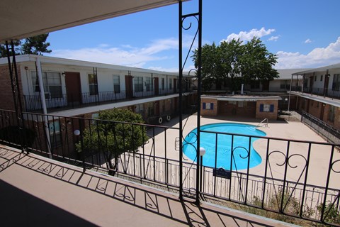 a view of the pool from the balcony