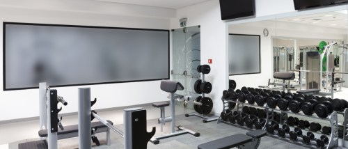 Exercercise equipment in the fitness center of a rental apartment building.