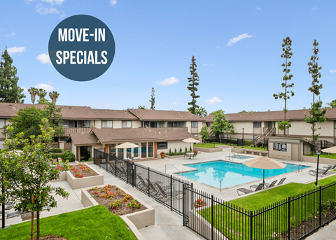 move in specials at our apartments in tempe with a swimming pool and a building